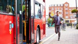 man running late to buy travel insurance